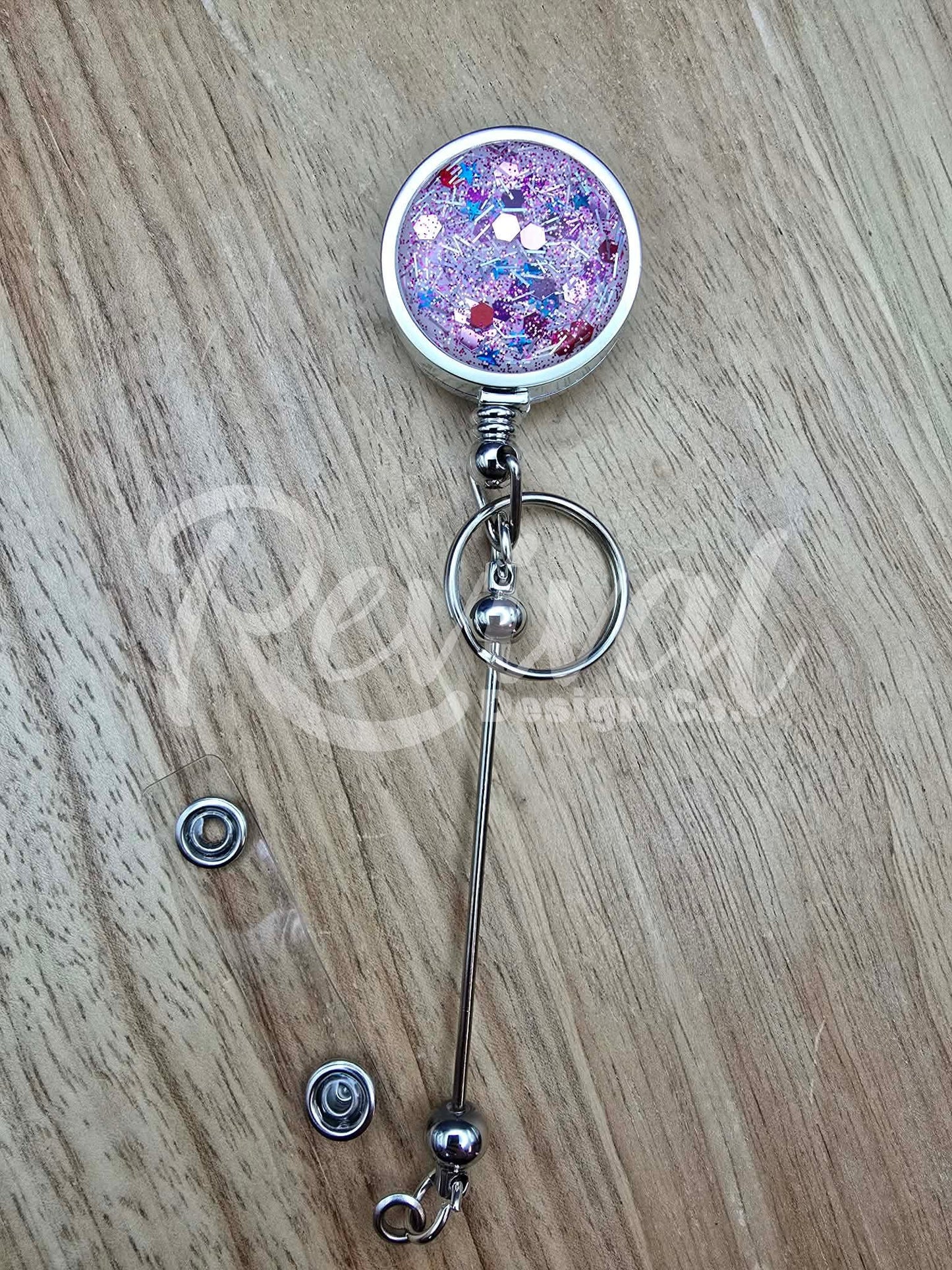 Poppy - Glitter Bar Badge Reel