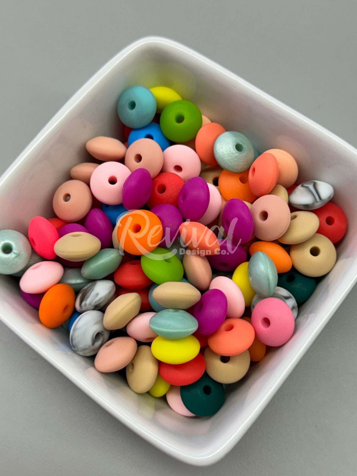 Silicone Lentil Spacers - Confetti - Pack of 50